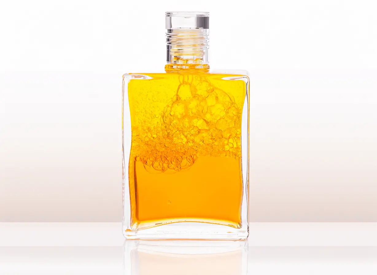 Aura-Soma Equilibrium Flasche B004 Sonnenflasche: Gelb über Gold. Eine zweischichtige Glasflasche mit klarem Deckel.